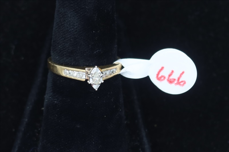 LOT, (1) YELLOW METAL RING WITH CLEAR STONES, SIZE 7 (TESTS POSITIVE